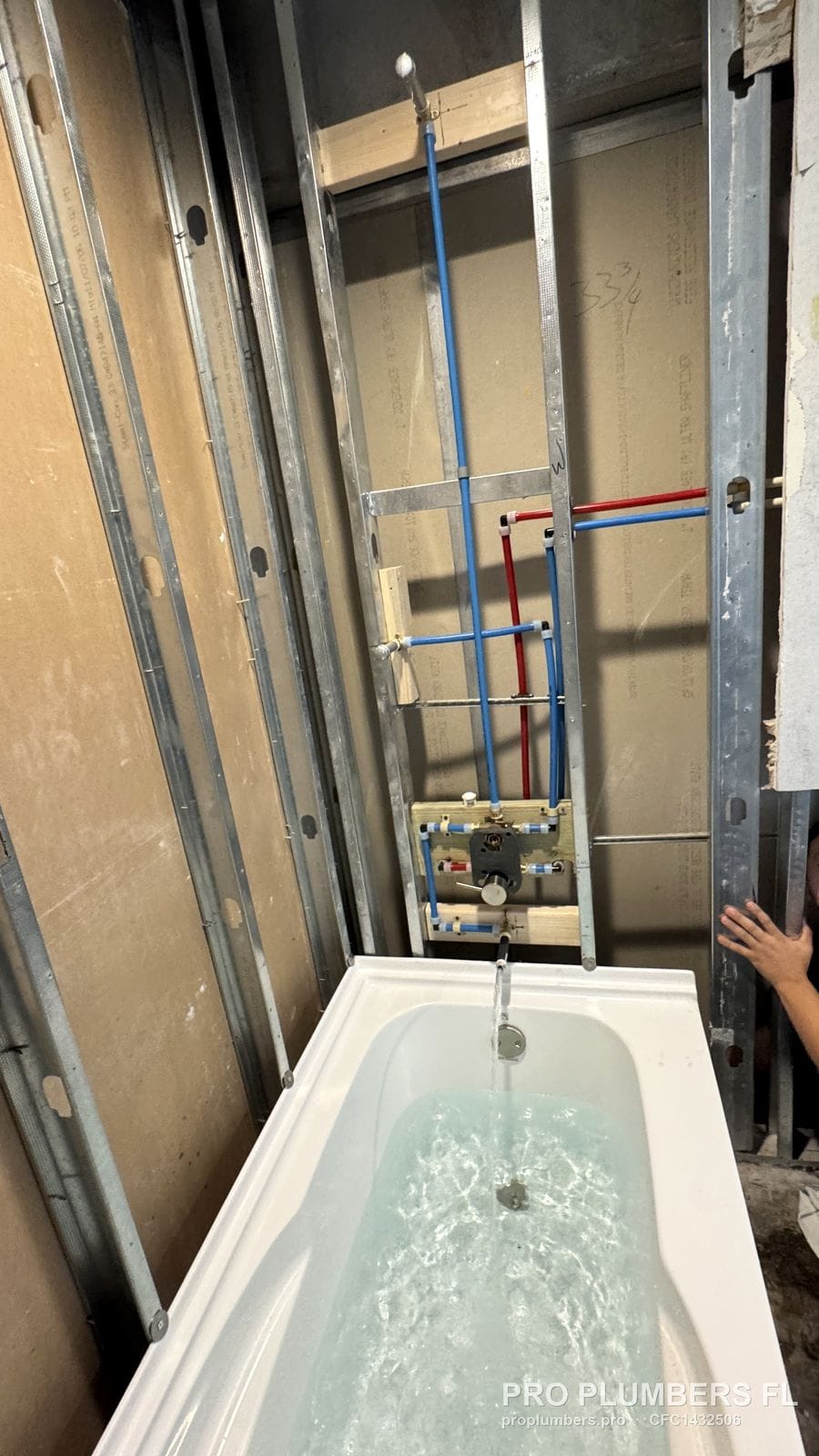 Bathtub water test with the PEX-A valve rough-in above in Tampa, Florida by PRO PLUMBERS FL, LLC (licence CFC1432506)