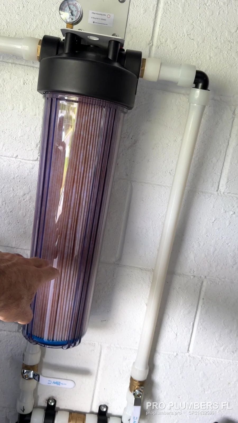 Clear sediment filter housing with pressure gauge in Bradenton, Florida by PRO PLUMBERS FL, LLC (licence CFC1432506)