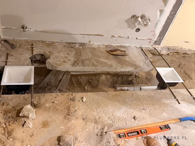 Commercial kitchen floor drains set in slab — West Palm Beach, FL