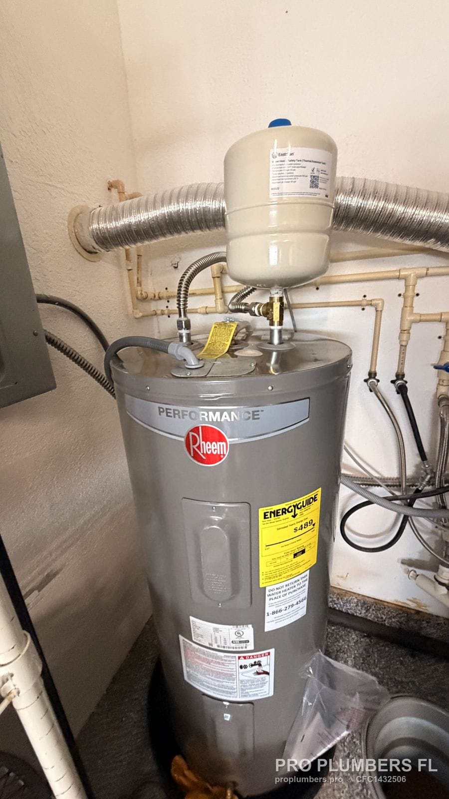 Electric tank water heater with thermal expansion tank and CPVC piping in St. Petersburg, Florida by PRO PLUMBERS FL, LLC (licence CFC1432506)