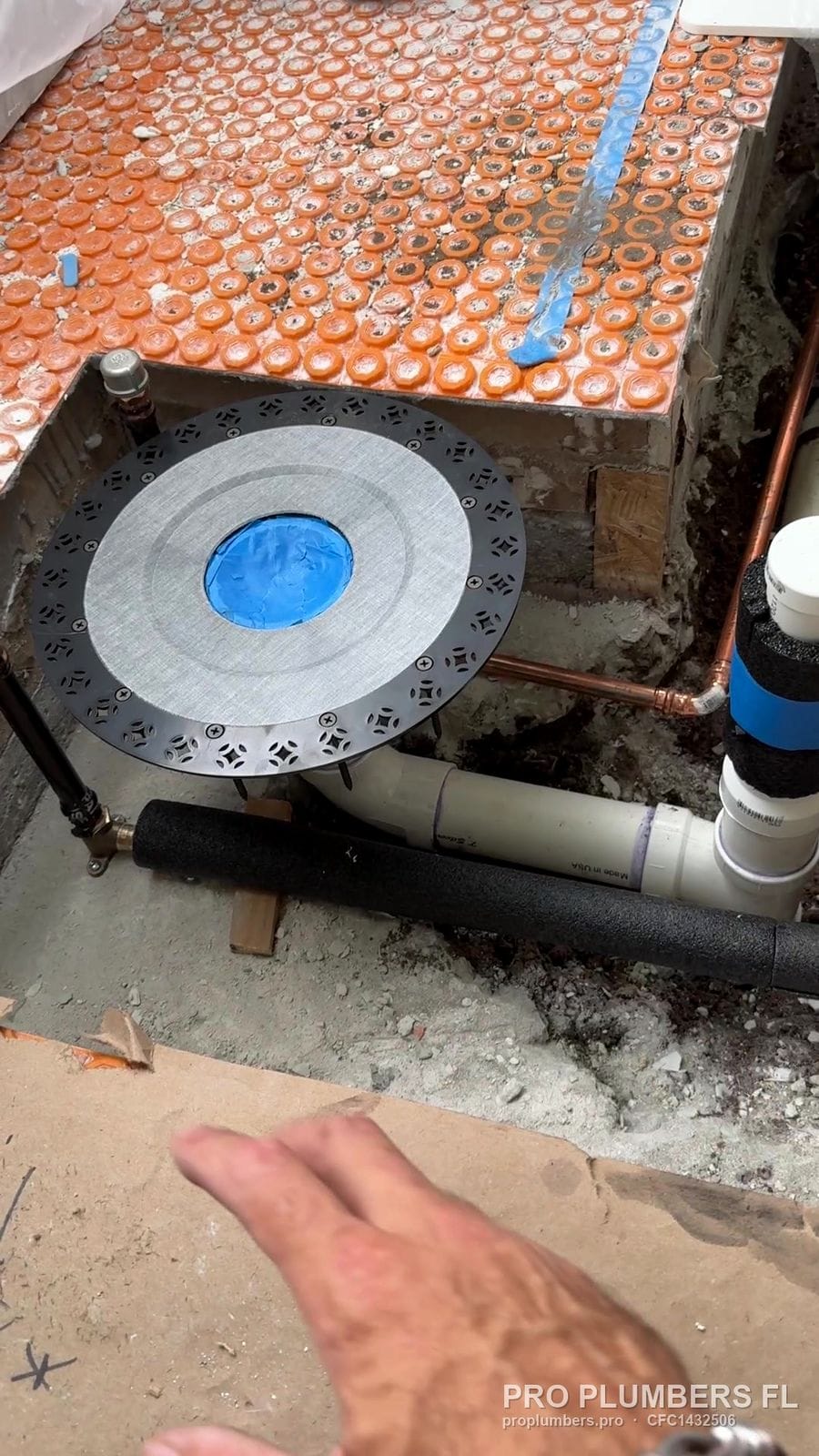 Floor-mount tub filler rough-in plate with test cap and insulated supplies before tile in East Lake, Florida by PRO PLUMBERS FL, LLC (licence CFC1432506)