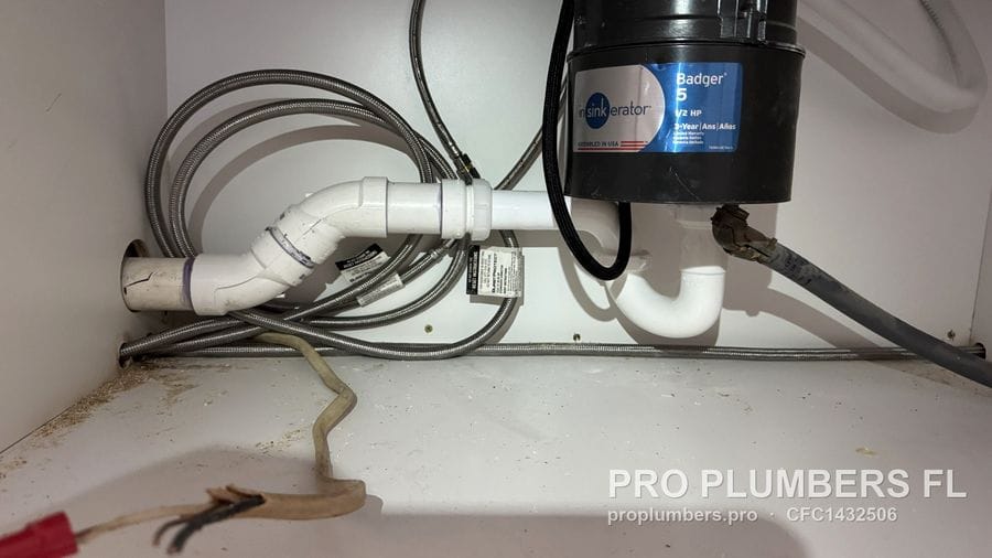 InSinkErator Badger 5 disposal with new PVC trap and dishwasher connection in Seminole, Florida by PRO PLUMBERS FL, LLC (licence CFC1432506)