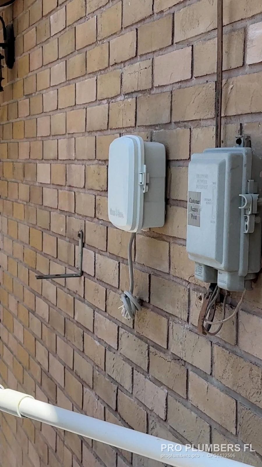 Irrigation controllers mounted on a brick wall in Ruskin, Florida by PRO PLUMBERS FL, LLC (licence CFC1432506)
