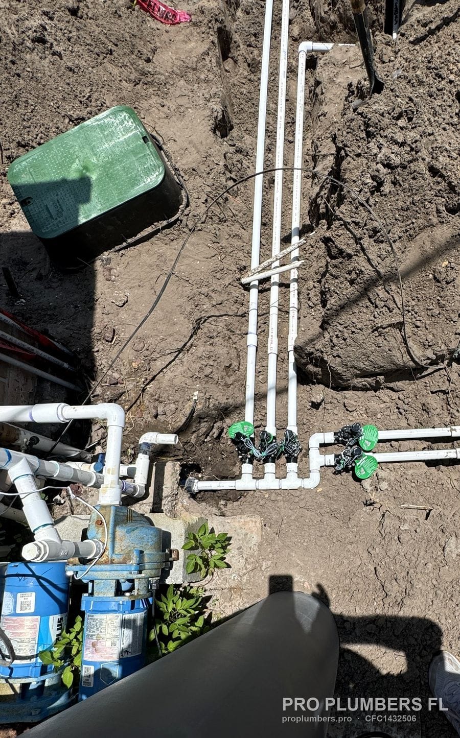 Irrigation pump with PVC discharge feeding a solenoid valve manifold and laterals in Ruskin, Florida by PRO PLUMBERS FL, LLC (licence CFC1432506)