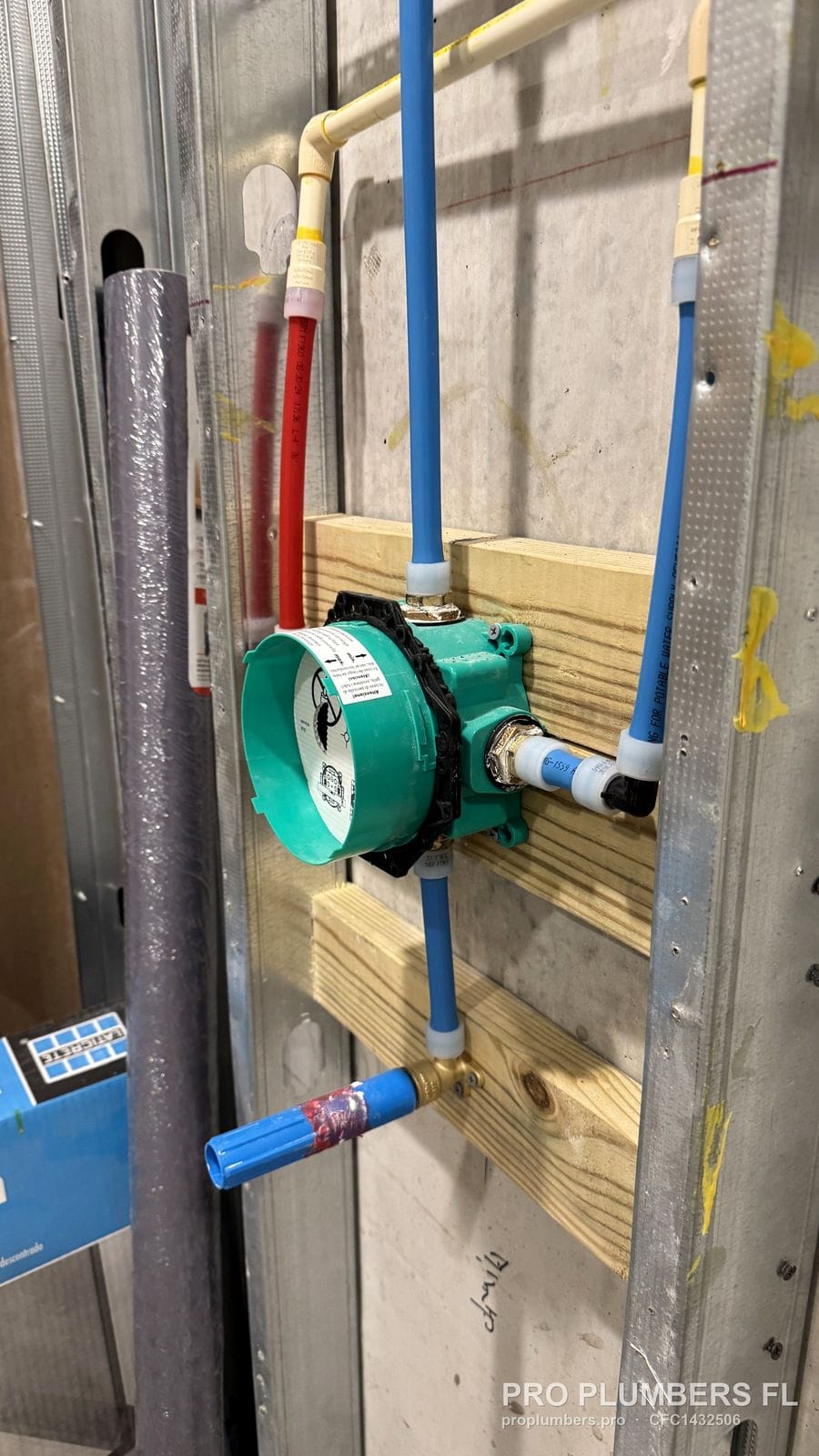 Close-up of a shower valve body connected with PEX-A expansion fittings in Tampa, Florida by PRO PLUMBERS FL, LLC (licence CFC1432506)