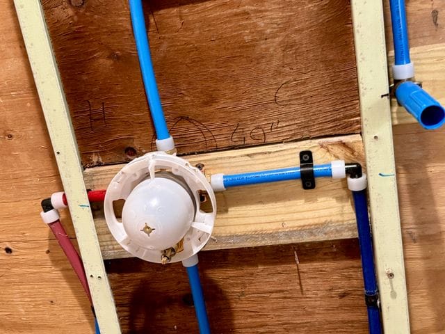 Tub and shower valve with plaster guard roughed in with PEX-A piping in Largo, Florida by PRO PLUMBERS FL, LLC (licence CFC1432506)