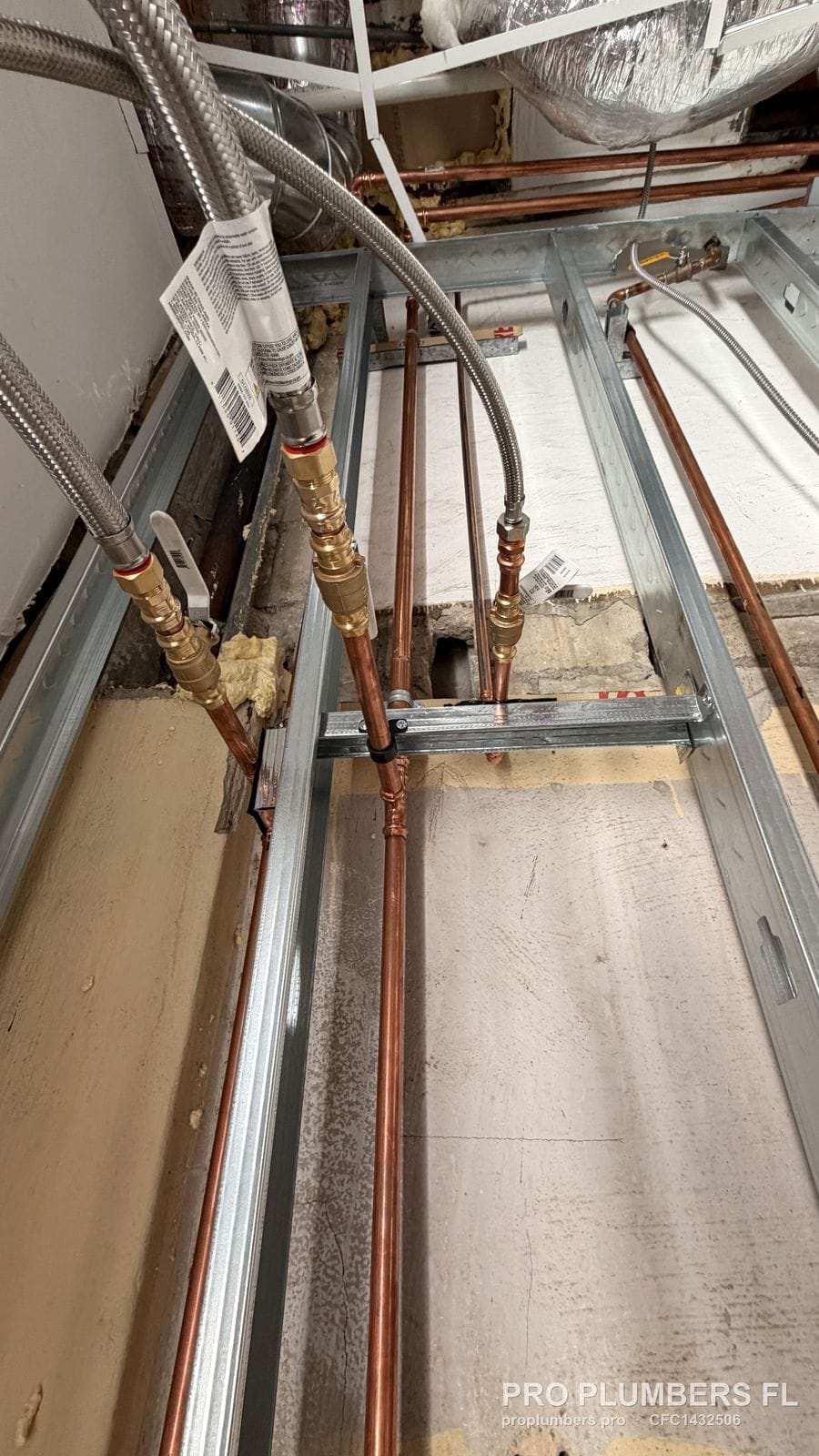 Press-fit copper water lines with brass ball valves in a metal-stud wall of a restaurant in West Palm Beach, Florida by PRO PLUMBERS FL, LLC (licence CFC1432506)