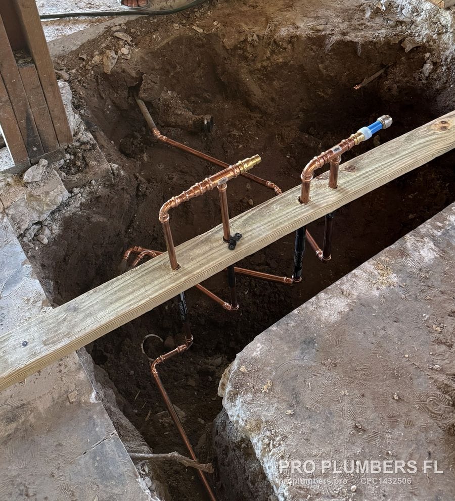 Copper water stub-ups in a trench cut through the slab during a repipe in Tampa, Florida by PRO PLUMBERS FL, LLC (licence CFC1432506)