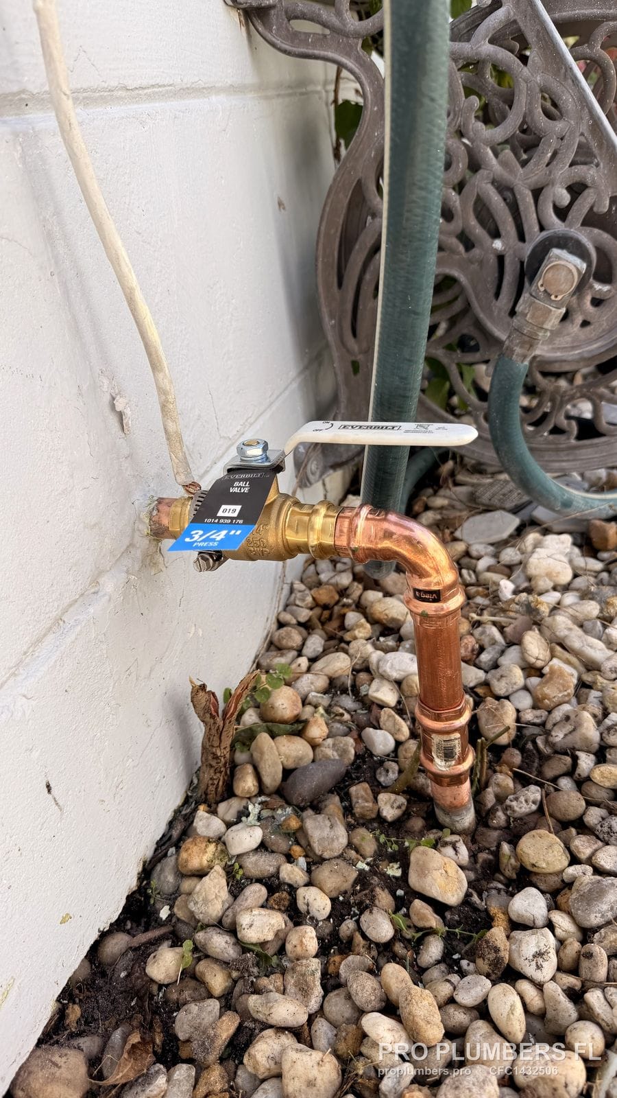 Press-fit copper riser with a 3/4-inch ball valve at an exterior wall in St. Petersburg, Florida by PRO PLUMBERS FL, LLC (licence CFC1432506)