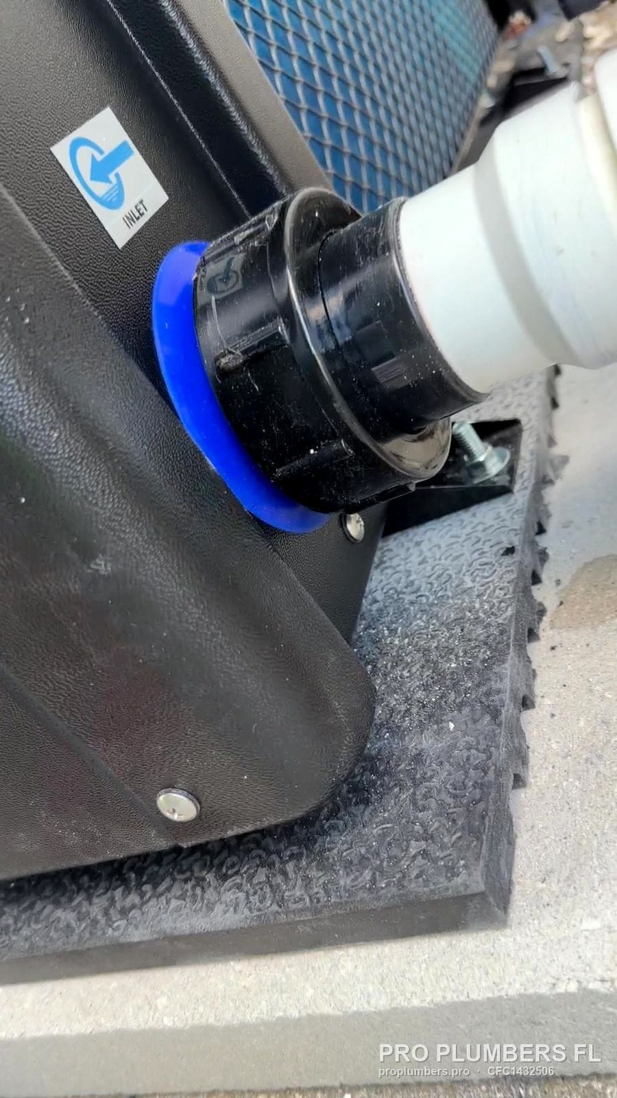 PVC union connection on a heat pump pool heater in Palm Harbor, Florida by PRO PLUMBERS FL, LLC (licence CFC1432506)