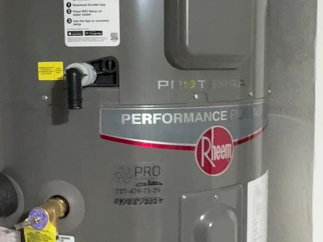 Rheem Performance Platinum heat pump water heater with EnergyGuide label in Belleair Beach, Florida by PRO PLUMBERS FL, LLC (licence CFC1432506)