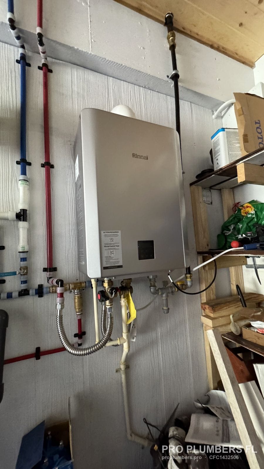 Rinnai gas tankless water heater with PEX lines and gas shutoff in a utility room in Englewood, Florida by PRO PLUMBERS FL, LLC (licence CFC1432506)