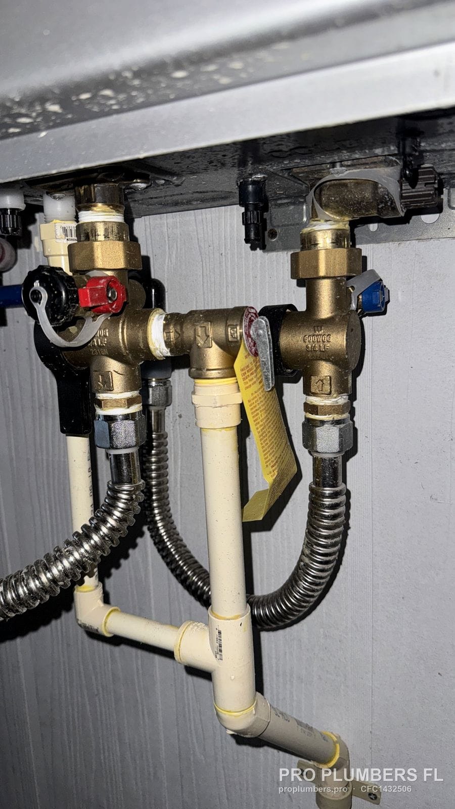 Tankless water heater isolation valve kit with drain ports and flex connectors in Englewood, Florida by PRO PLUMBERS FL, LLC (licence CFC1432506)