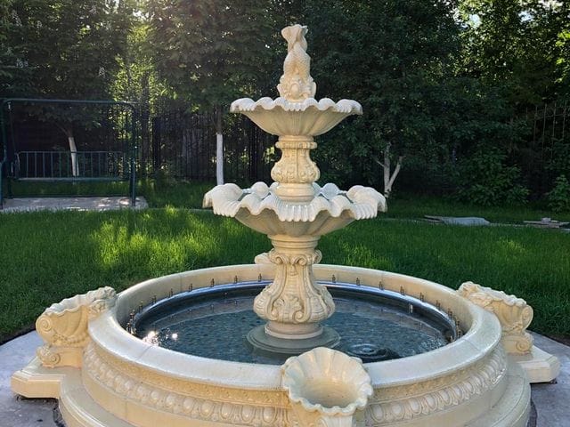 Tiered stone fountain — built abroad, portfolio