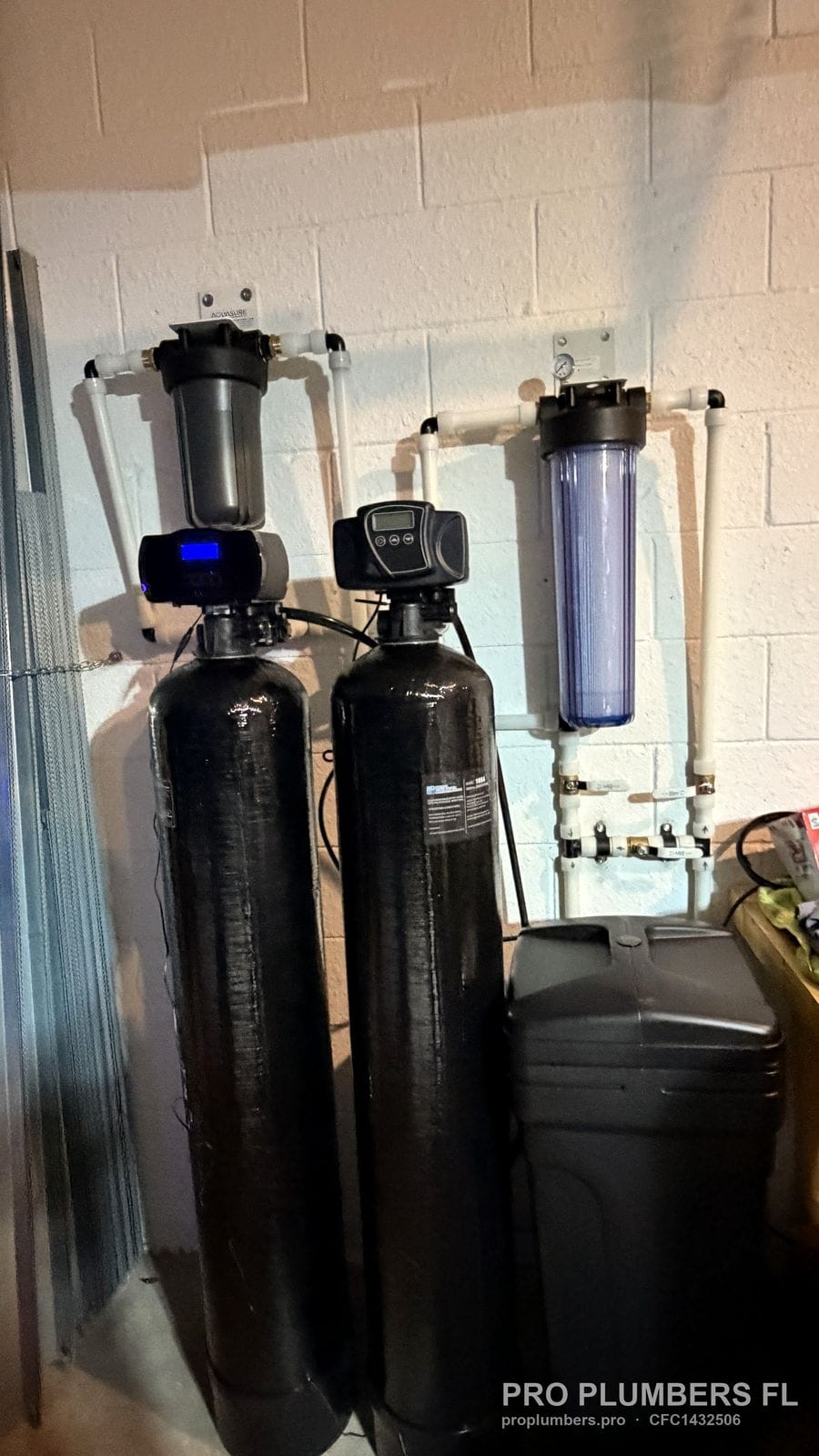 Straight-on view of the finished two-tank water treatment system in Bradenton, Florida by PRO PLUMBERS FL, LLC (licence CFC1432506)