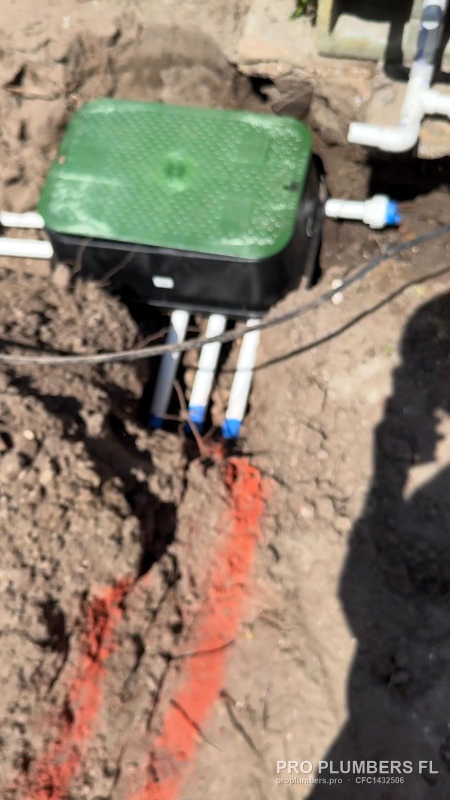Valve box with PVC laterals and marked trench routes in Ruskin, Florida by PRO PLUMBERS FL, LLC (licence CFC1432506)