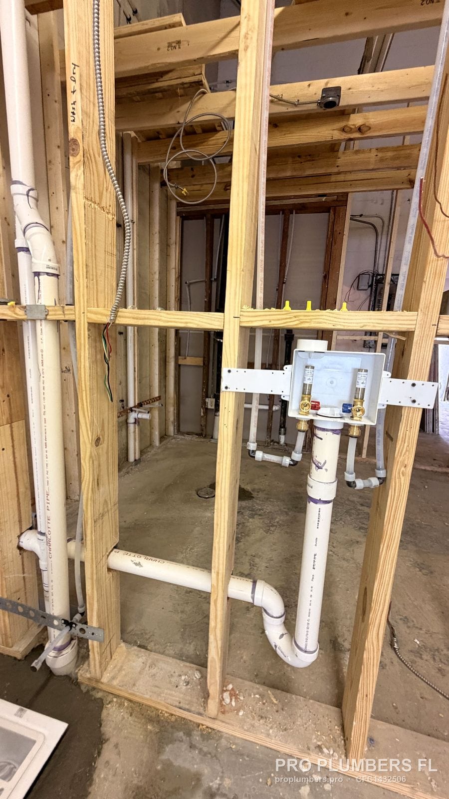 Washer outlet box with PVC drain and trap in new wood framing in Brooksville, Florida by PRO PLUMBERS FL, LLC (licence CFC1432506)