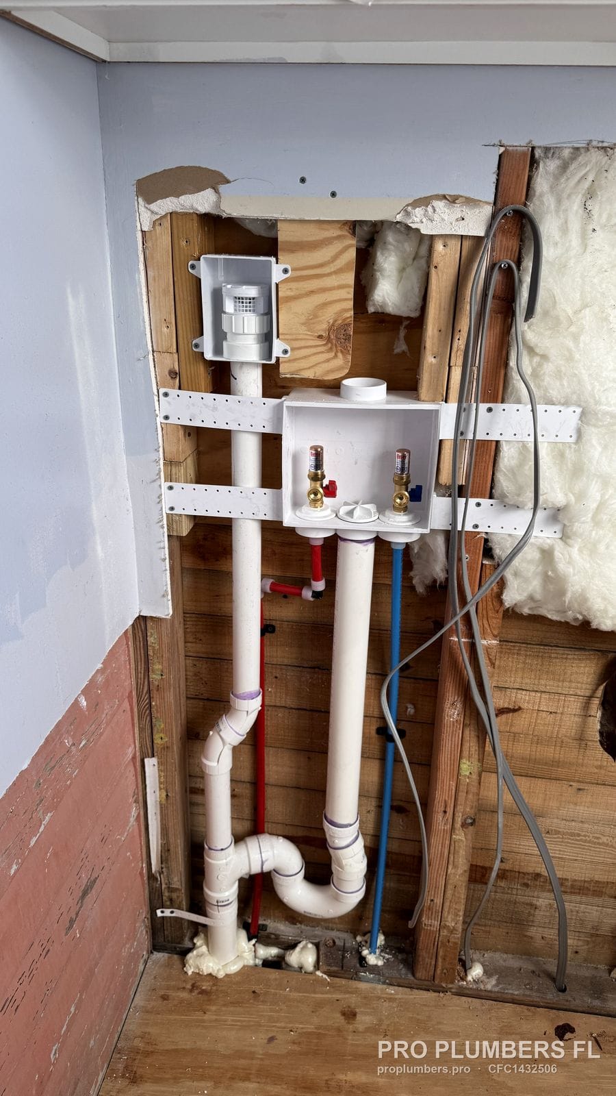 Recessed washer outlet box with PVC standpipe and trap mounted on stud brackets in South Pasadena, Florida by PRO PLUMBERS FL, LLC (licence CFC1432506)