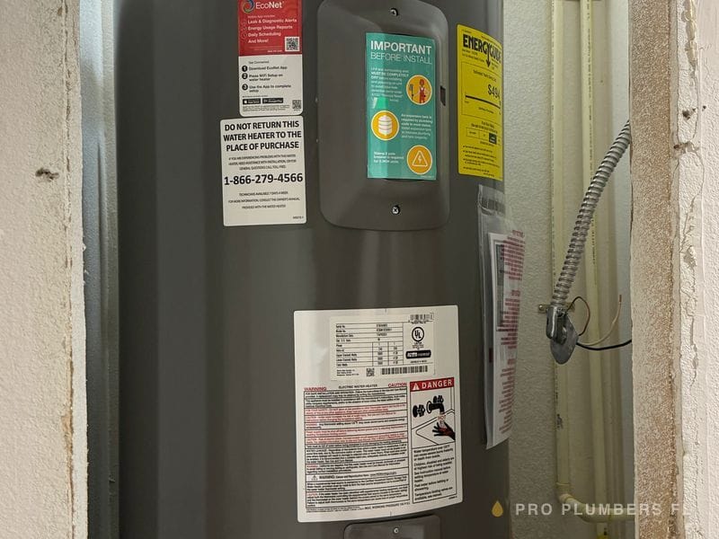 New water heater installed on a stand — Sarasota County, FL