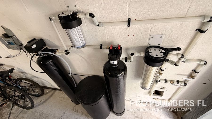 Overhead view of the softener, media tank, brine tank and clear prefilter in Westchase, Florida by PRO PLUMBERS FL, LLC (licence CFC1432506)